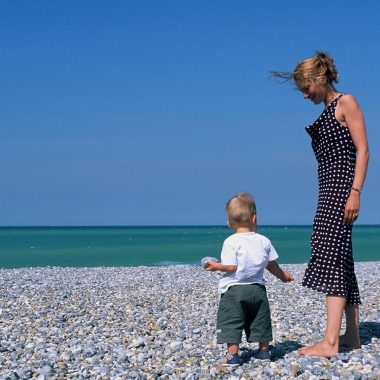 Mum and baby on the beach