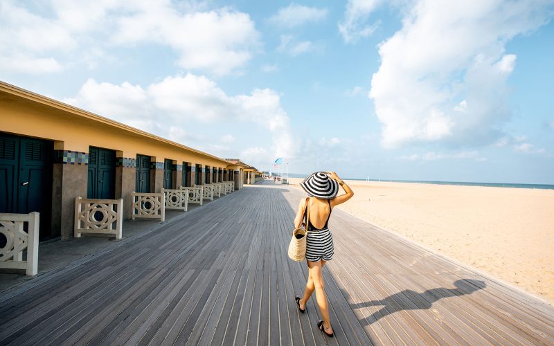 A woman on Les Planches in Deauville