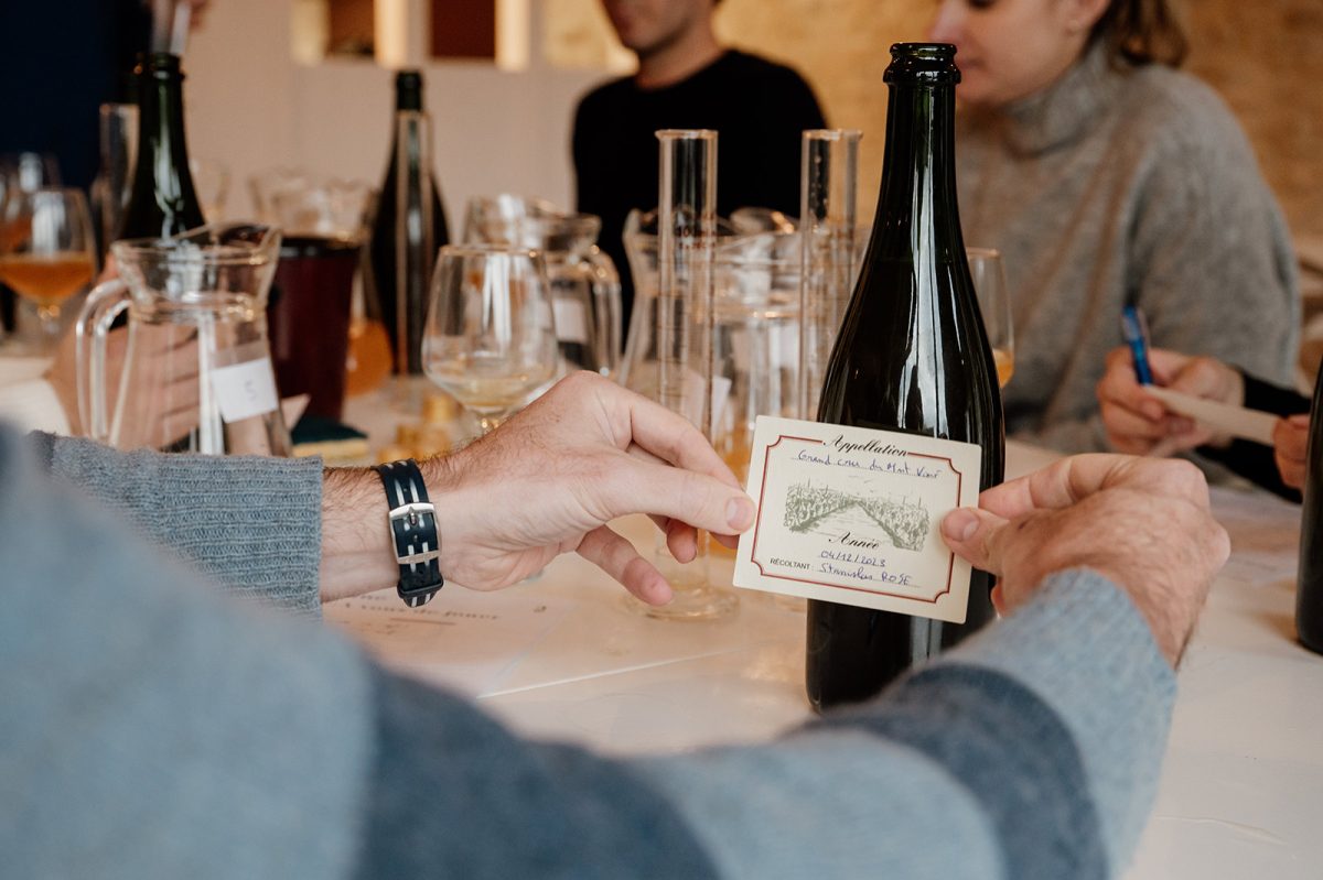 Labeling our liquid masterpieces ! Cheers to crafting our own cider identity!© Marie-Anaïs Thierry 